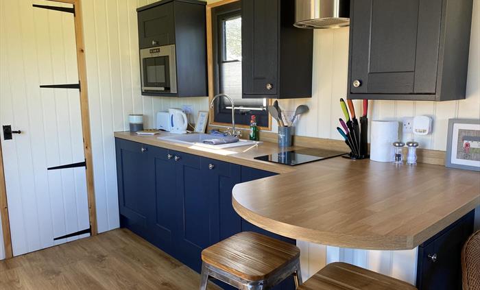 Beautiful and fully equipped for self catering.  Includes electricity, double bed, tv electric log burner and own toilet/shower.  Cost also includes l
